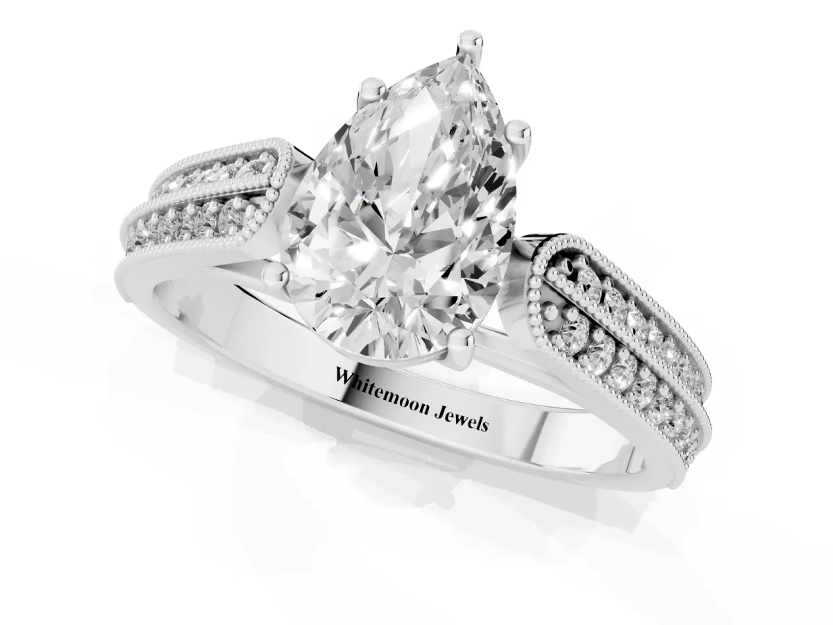 Pear Cut Cut Pave Split Shank Engagement Ring with Four-Prong Setting Platinum