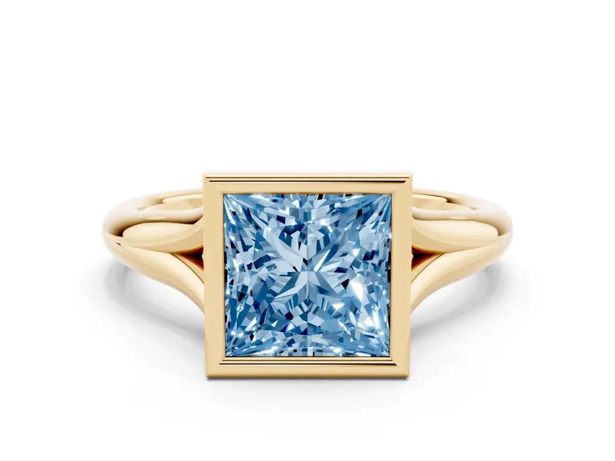 Fancy Blue Bezel Set Princess Cut Solitaire Diamond Ring with Smooth Band Yellow gold