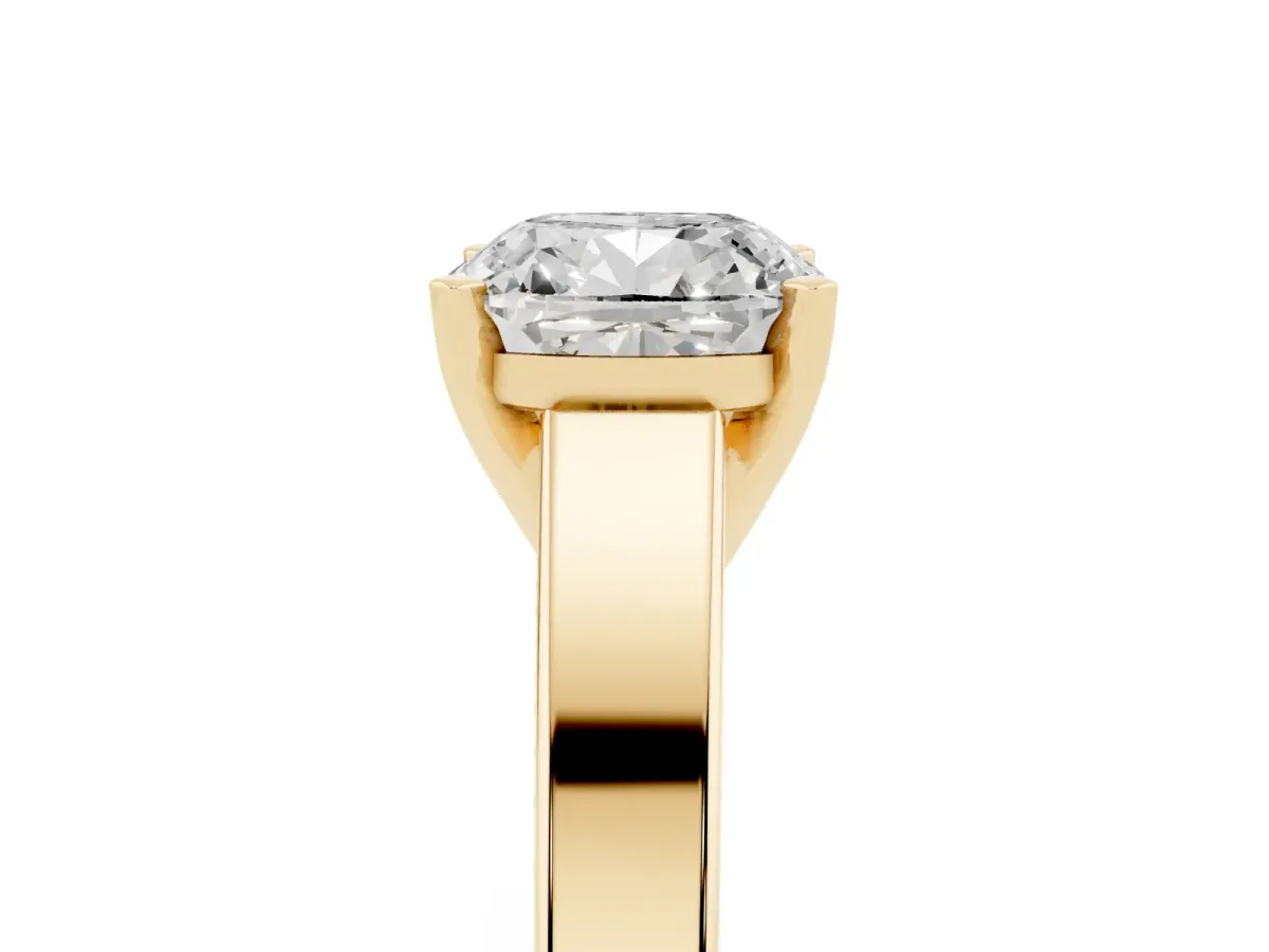 Cushion Cut Solitaire Engagement Ring with Four-Prong Setting and Tapered Band Yellow gold