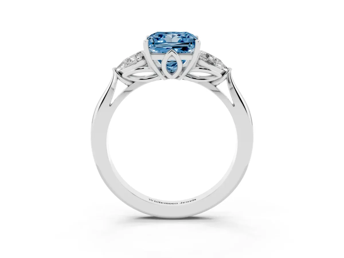 Fancy Blue Three-Stone Princess Cut Diamond Ring with Pear Side Stones in Four-Prong Setting Silver