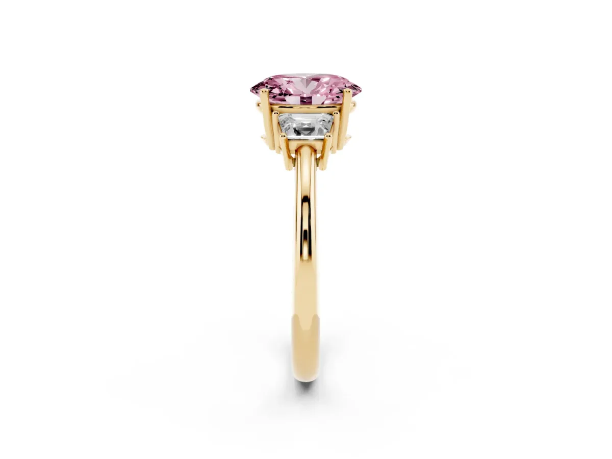 Fancy Pink Oval Cut Diamond Three-Stone Ring with Trapezoid Side Stones and Prong Setting Yellow gold