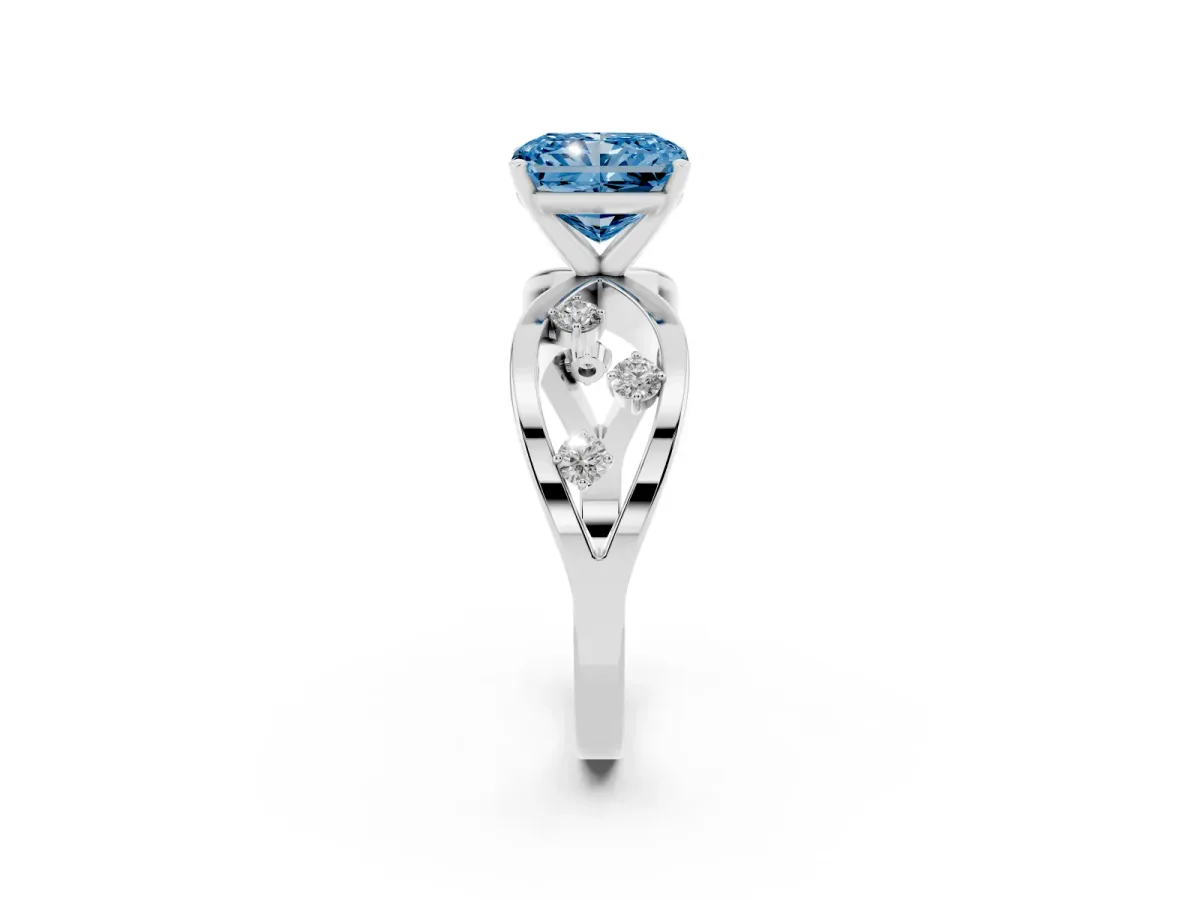 Fancy Blue Radiant Cut Cut Solitaire Diamond with Side Stones on Criss-Cross Band and Four-Prong Setting Platinum