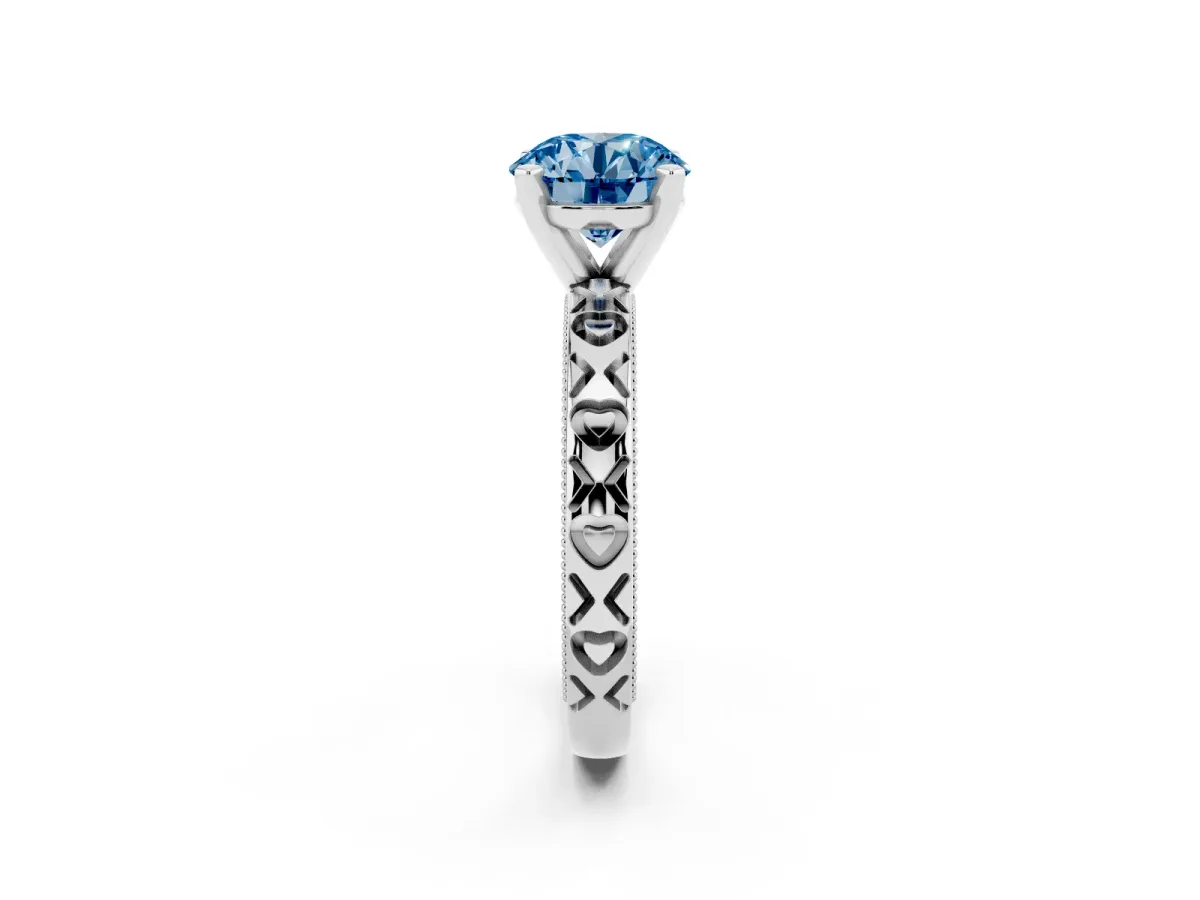 Fancy Blue Round Cut Solitaire Diamond Engagement Ring with XO Engraved Band and Four-Prong Setting Silver
