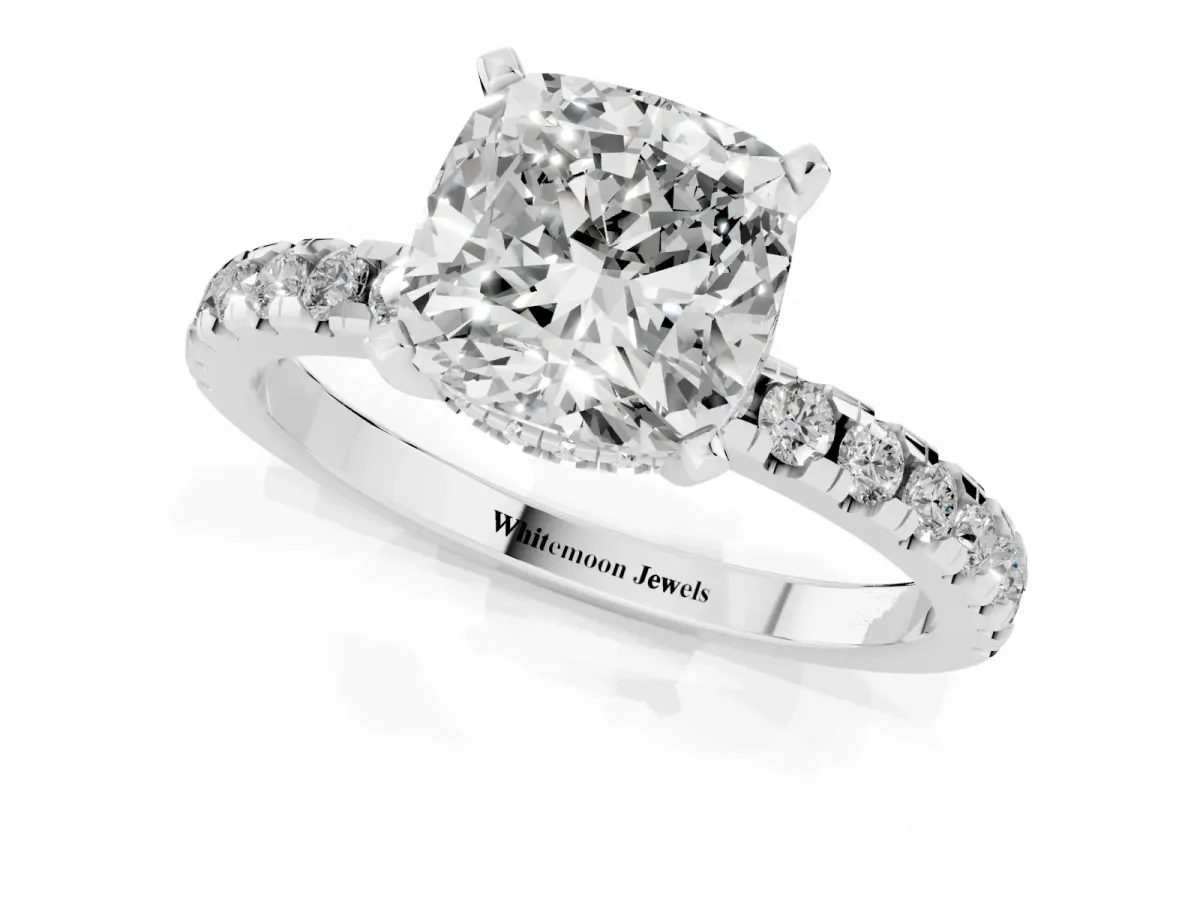 Cushion Cut Diamond Solitaire Ring with Round Pavé Band and Four-Prong Setting Silver