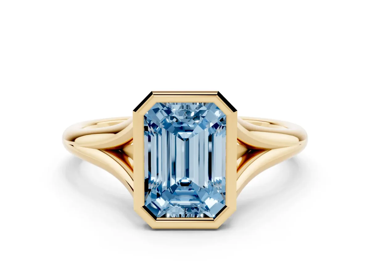 Fancy Blue Bezel Set Emerald Cut Cut Solitaire Ring with Tapered Band Yellow gold