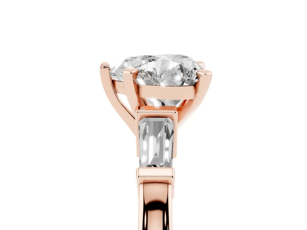 Heart Cut Cut Diamond Solitaire Ring with Tapered Baguette Accents and Four-Prong Setting Rose gold