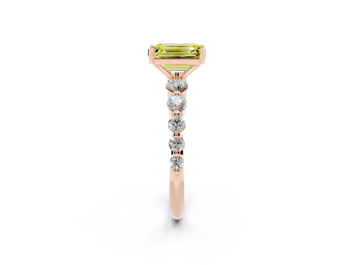 Fancy Yellow Emerald Cut Solitaire Diamond Ring with Pave Band and Four-Prong Setting Rose gold