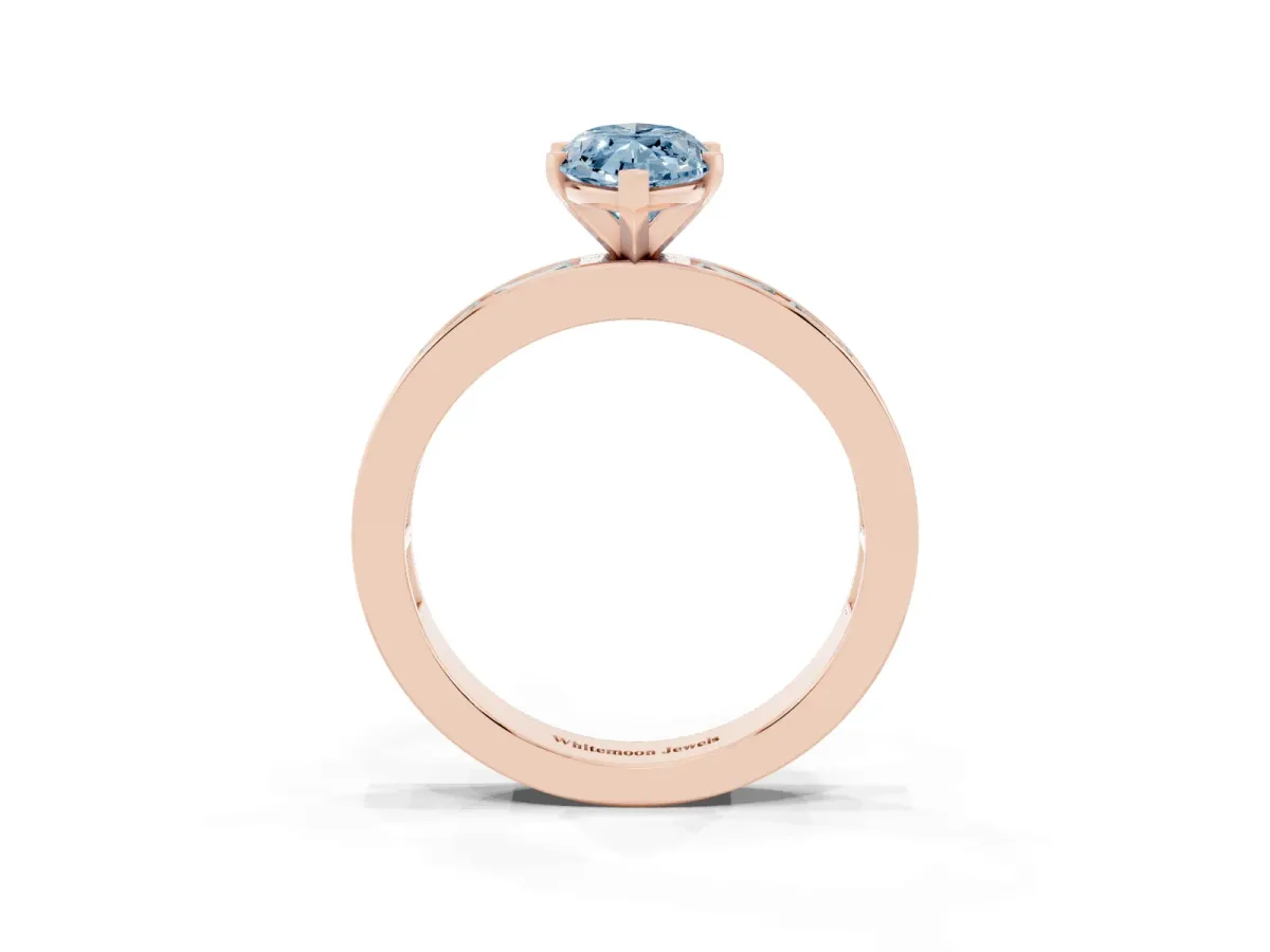 Fancy Blue Marquise Cut Solitaire Diamond Ring with Channel-Set Baguette Band and Four-Prong Setting Rose gold
