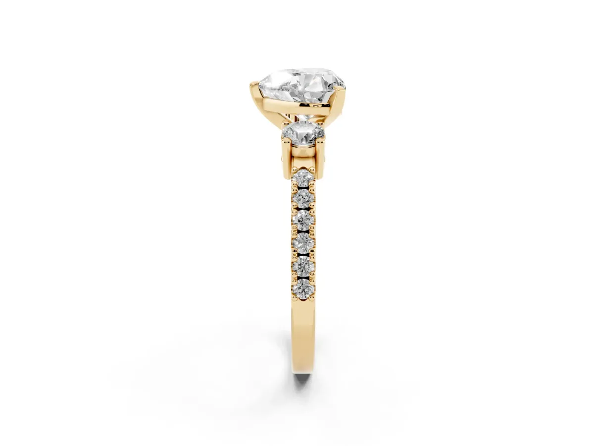 Heart Cut Three-Stone Diamond Pavé Band with Prong Setting Yellow gold