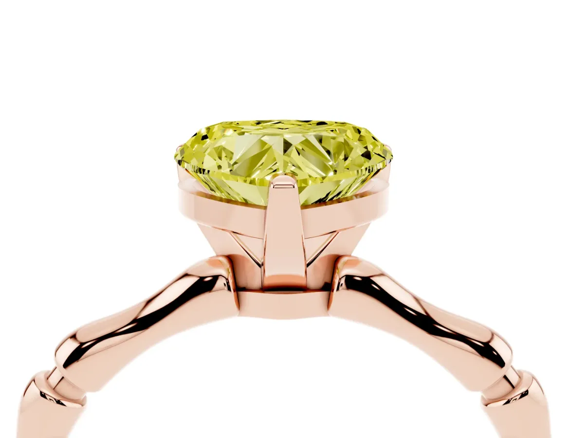 Fancy Yellow Heart Cut Solitaire Diamond Ring with Bamboo Band and Four-Prong Setting Rose gold