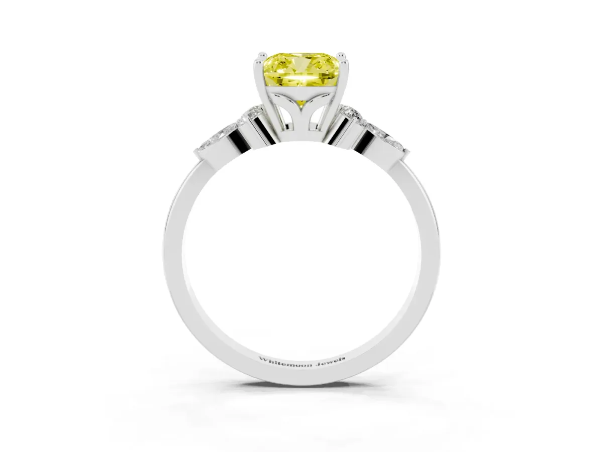 Fancy Yellow Cushion Cut Brilliant Diamond Solitaire Ring with Pear Side Stones and Four-Prong Setting Platinum