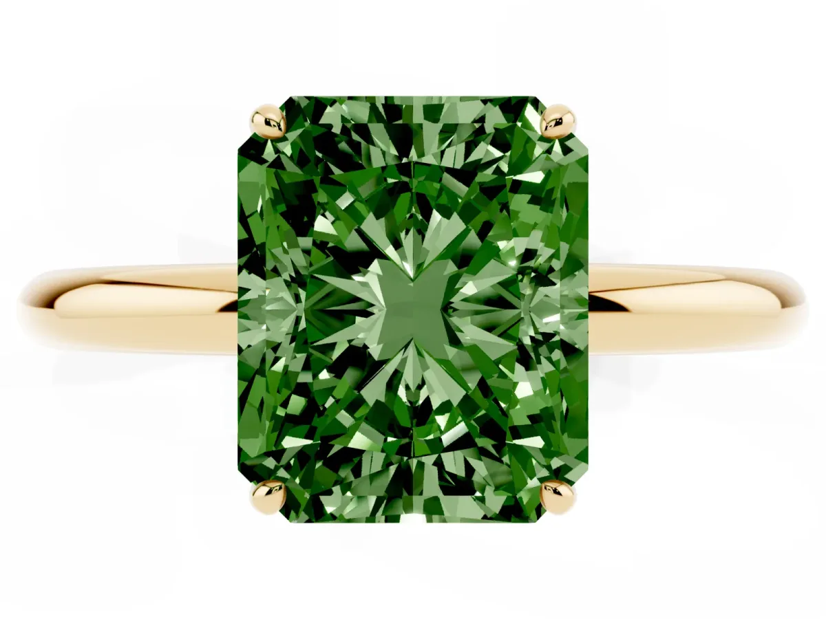 Fancy Green Radiant Cut Solitaire Diamond Ring with Four-Prong Setting on a Plain Band Yellow gold