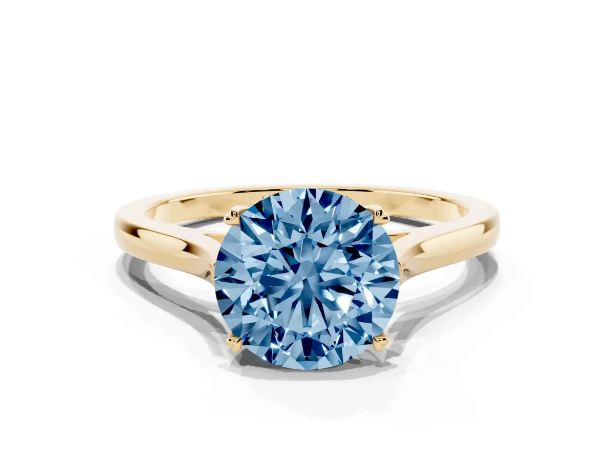 Fancy Blue Round Cut Solitaire Heart Prong Engagement Ring with Tapered Band Yellow gold