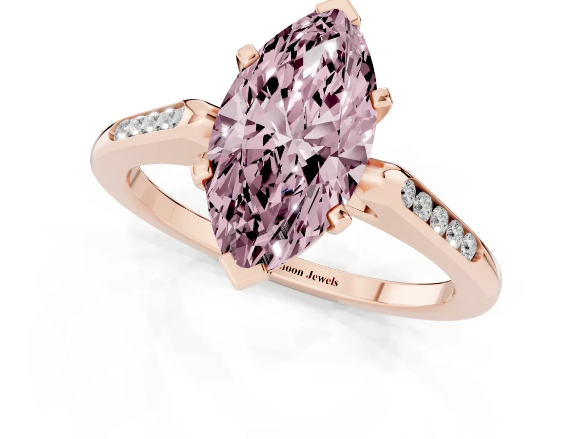 Fancy Pink Marquise Cut Diamond Solitaire Ring with Channel Set Round Band and Prong Setting Rose gold