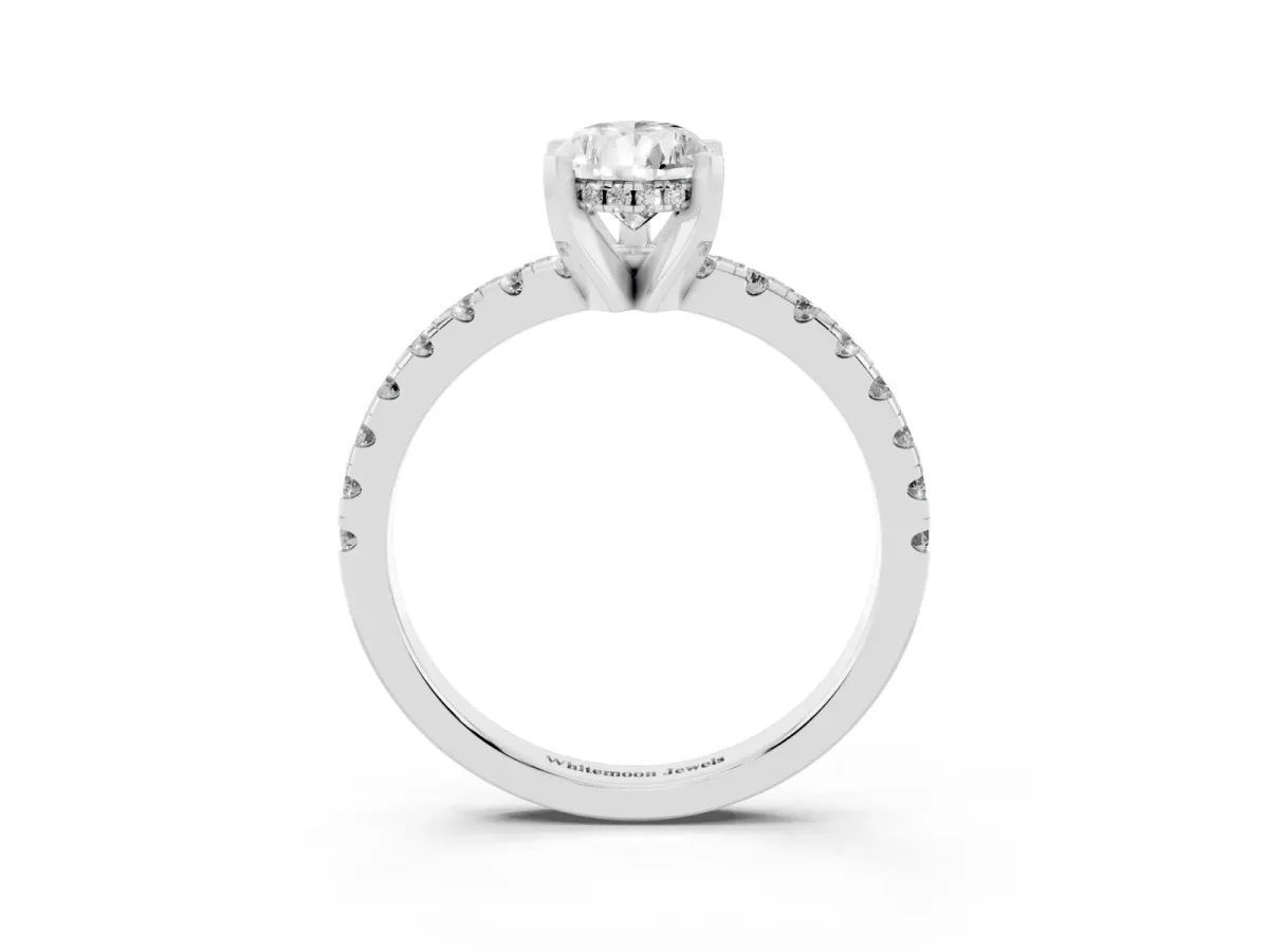 Pear Cut Diamond Solitaire Ring with Round Pavé Band and Four-Prong Setting Silver