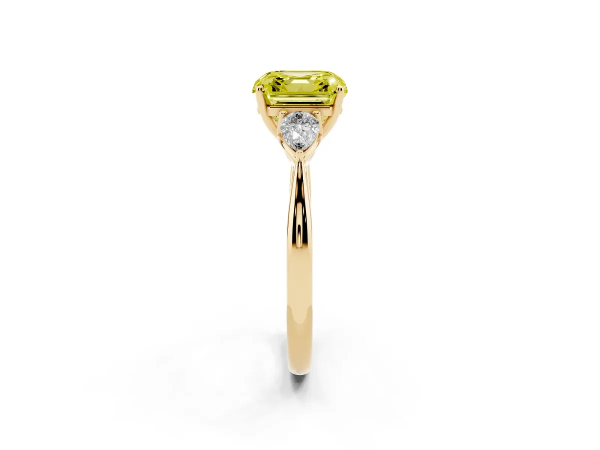 Fancy Yellow Three-Stone Asscher Cut Diamond Ring with Pear Side Stones in Four-Prong Setting Yellow gold