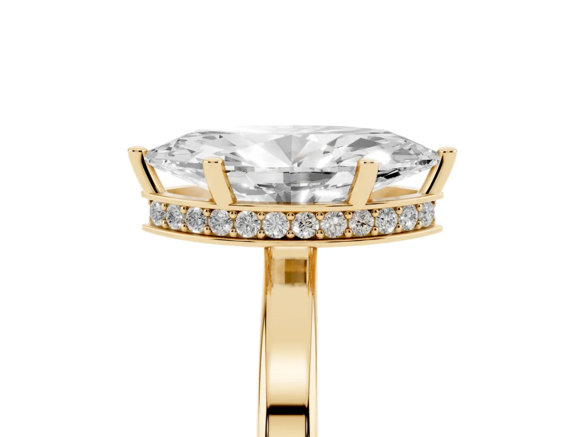 Marquise Cut Cut Solitaire Engagement Ring with Four-Prong Setting on a Classic Band Yellow gold
