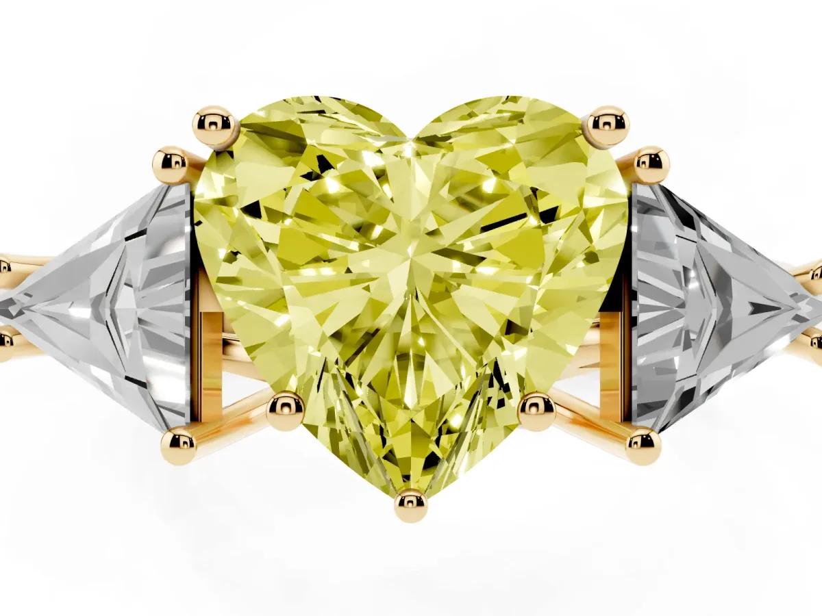 Fancy Yellow Three-Stone Heart Cut Diamond Engagement Ring with Trillion Side Stones and Prong Setting Yellow gold