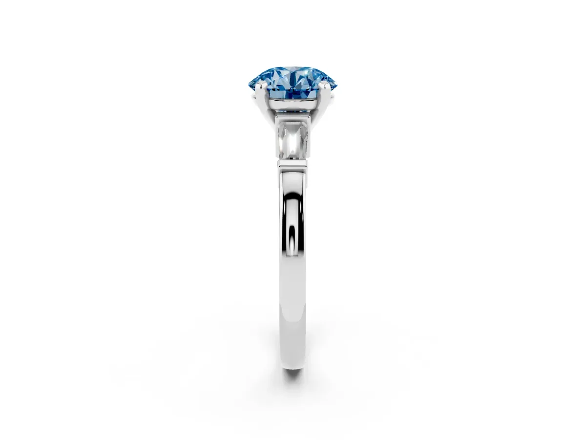 Fancy Blue Round Cut Cut Diamond Solitaire Ring with Tapered Baguette Accents and Four-Prong Setting White gold