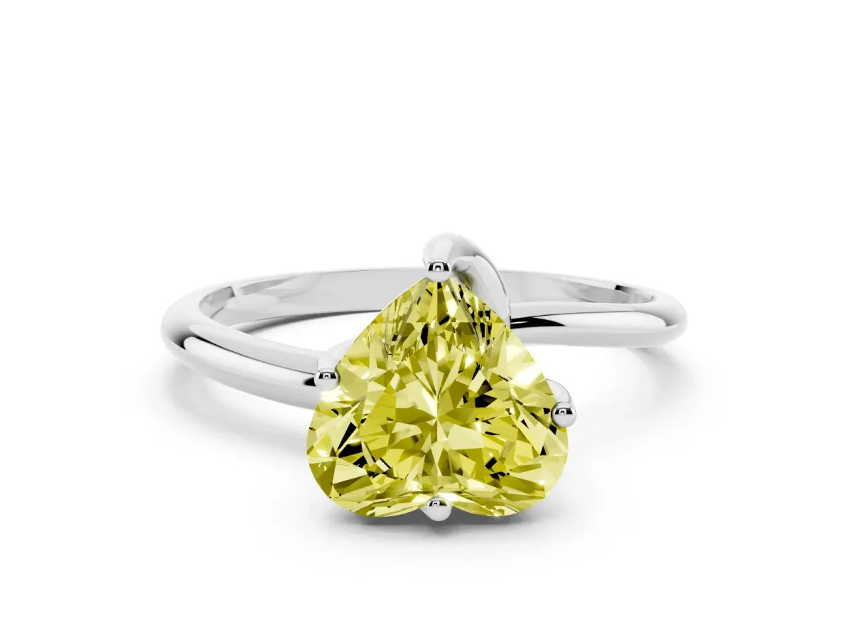 Fancy Yellow Heart Cut Diamond Solitaire Engagement Ring with Four-Prong Setting and Classic Band Silver