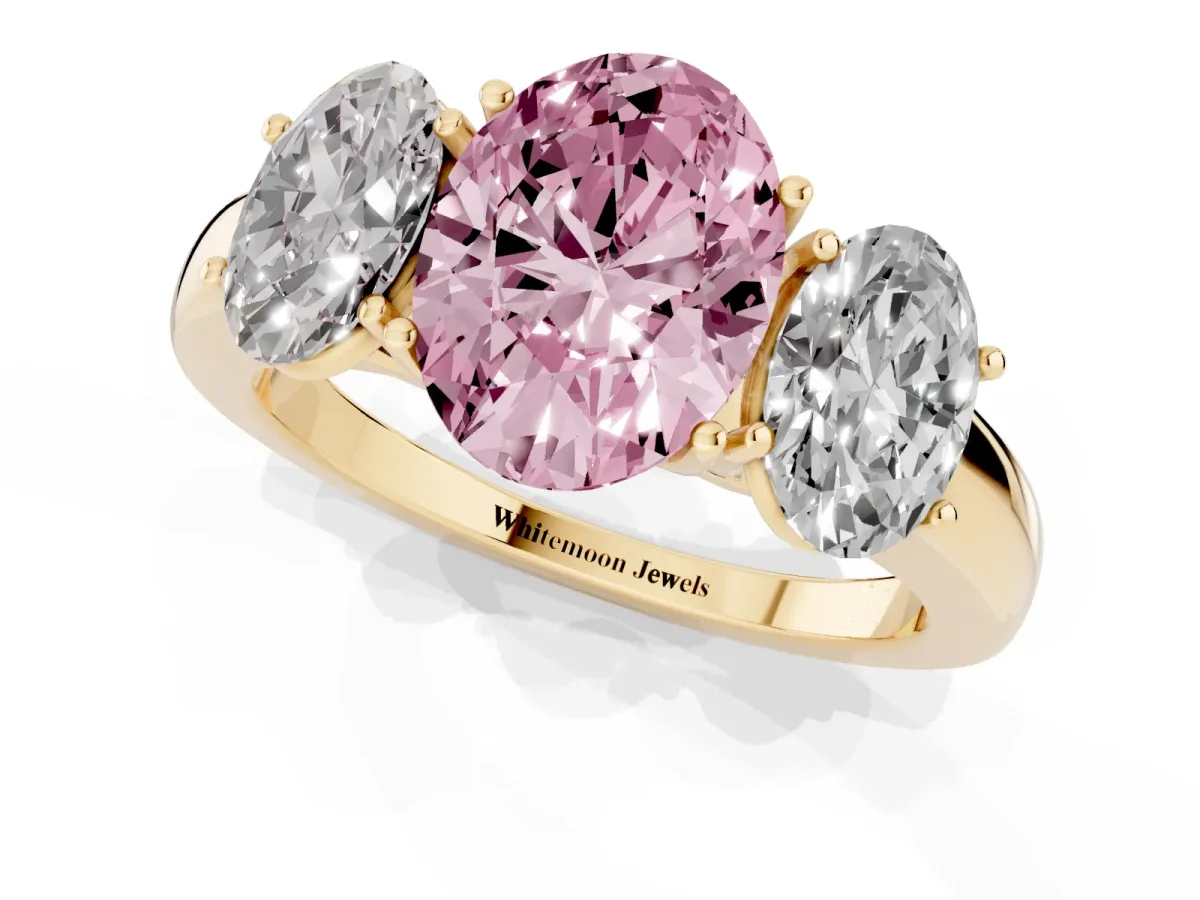 Fancy Pink Oval Cut Diamond Three-Stone Ring with Four-Prong Setting and Classic Band Yellow gold