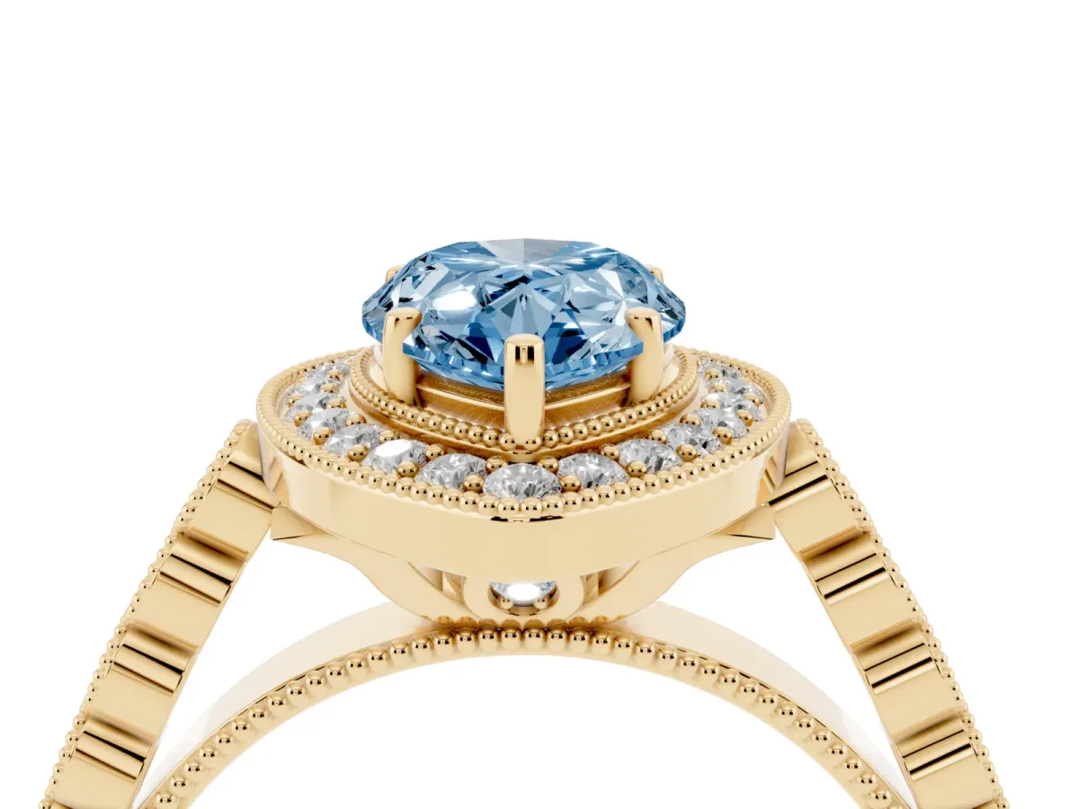 Fancy Blue Pear Cut Halo Milgrain Solitaire with Bezel Set Side Stones and Pave Band Yellow gold