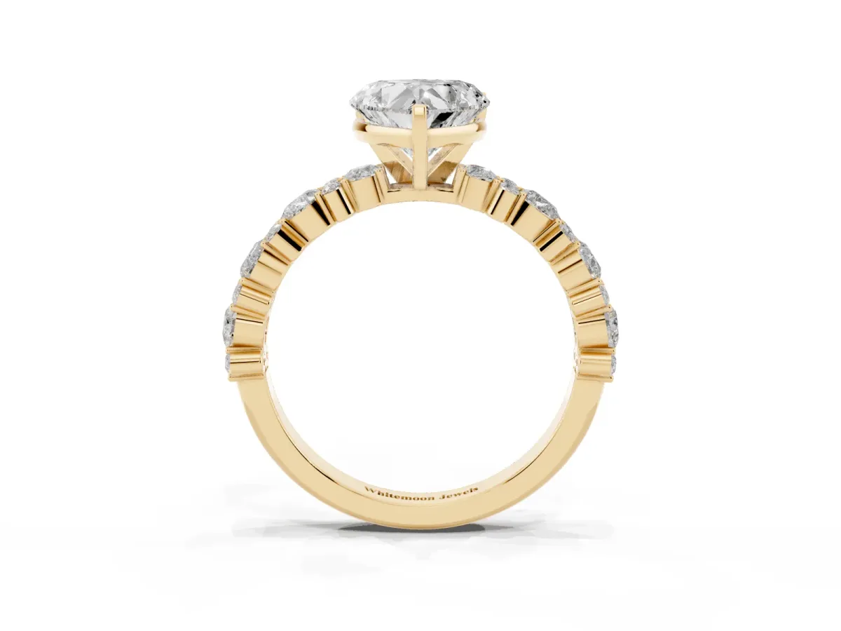 Heart Cut Diamond Side Stone Solitaire Ring with Round and Four-Prong Setting Yellow gold