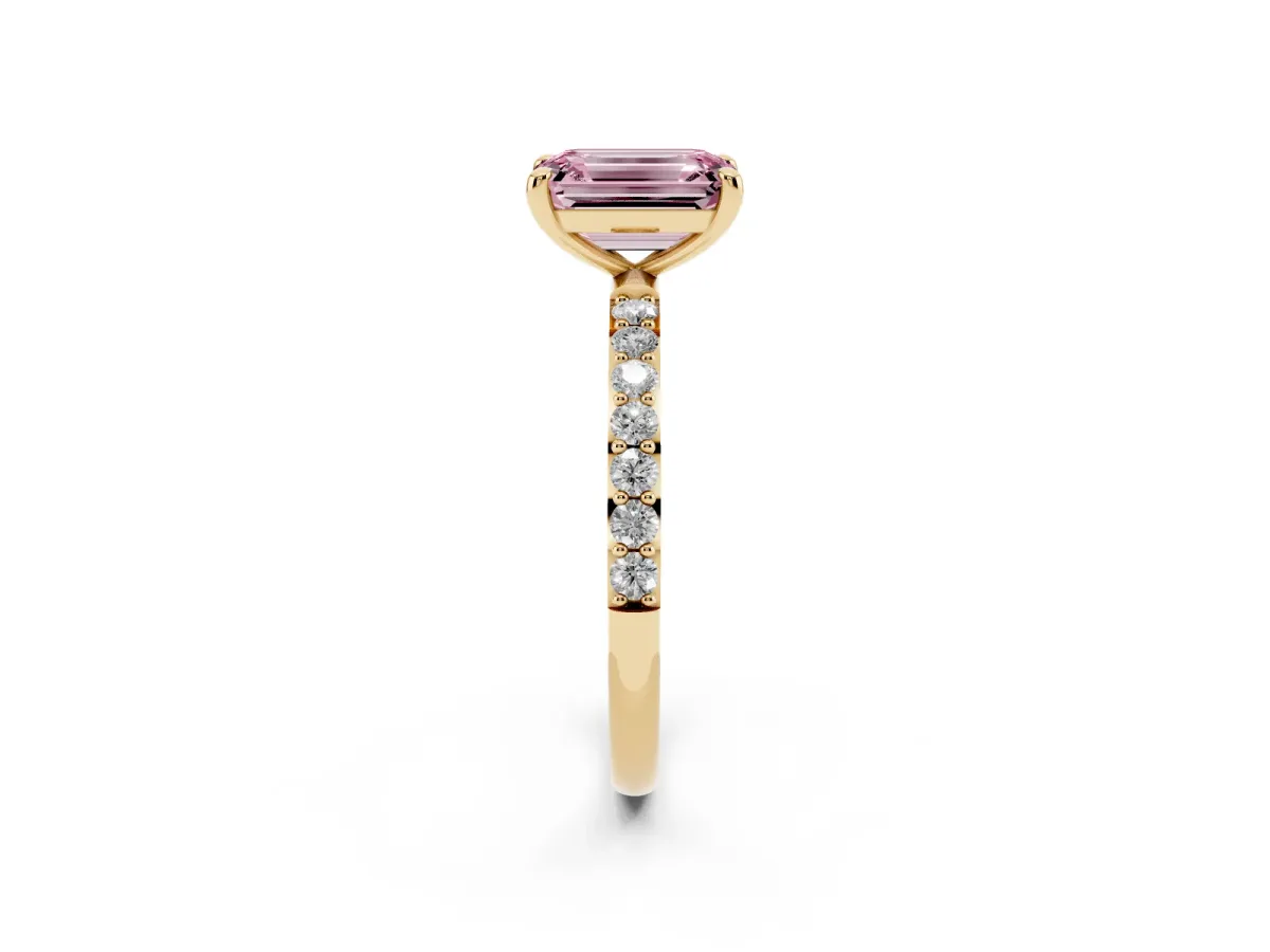 Fancy Pink Emerald Cut Diamond Solitaire Ring with Round Pavé Band and Prong Setting Yellow gold