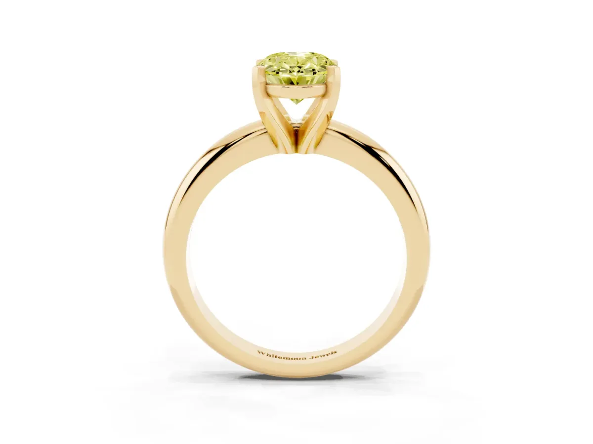 Fancy Yellow Oval Cut Diamond Solitaire Engagement Ring with Round Band and Four-Prong Setting Yellow gold