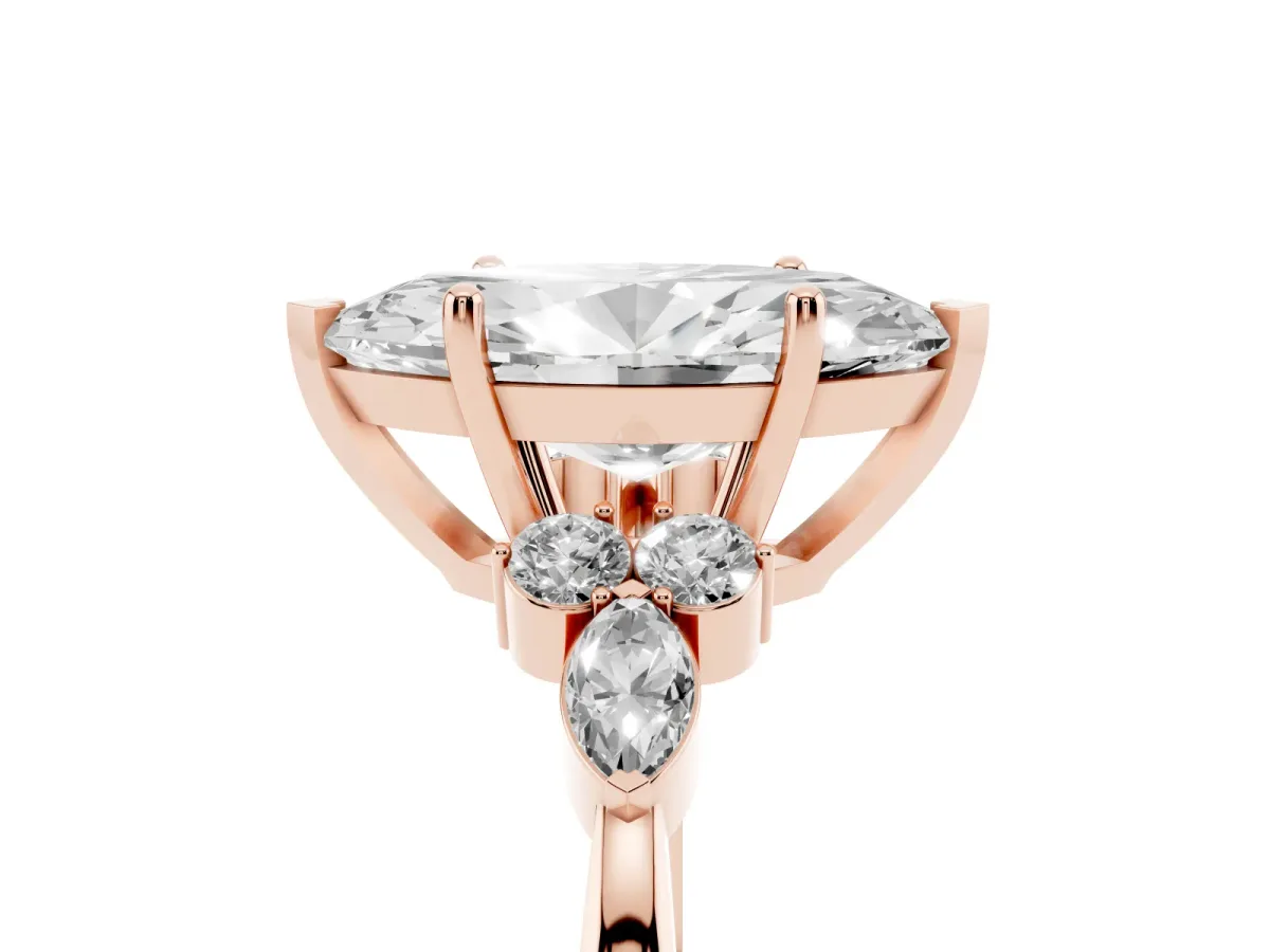 Marquise Cut Brilliant Diamond Solitaire Ring with Pear Side Stones and Four-Prong Setting Rose gold