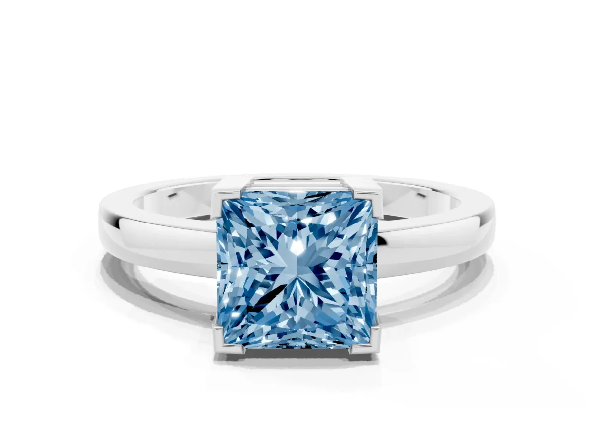 Fancy Blue Princess Cut Cut Solitaire Ring with Four-Prong Setting and Classic Band Silver