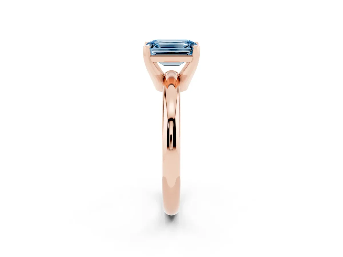 Fancy Blue Emerald Cut Diamond Solitaire Engagement Ring with Round Band and Four-Prong Setting Rose gold