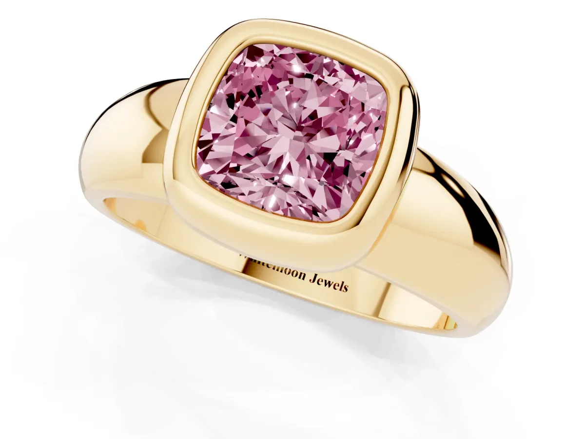 Fancy Pink Bezel Set Cushion Cut Solitaire Ring with Wide Band Yellow gold