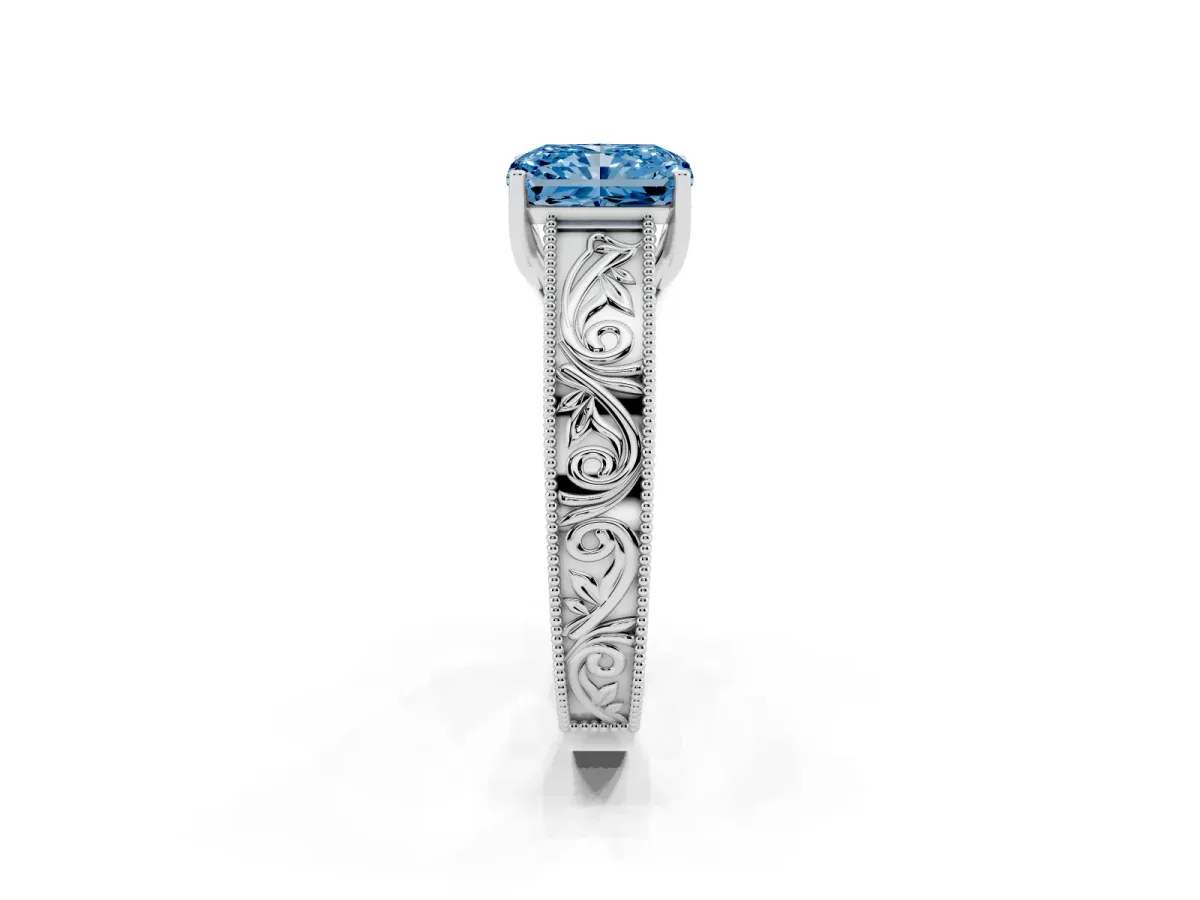 Fancy Blue Radiant Cut Diamond Solitaire Ring with Engraved Band and Four-Prong Setting White gold