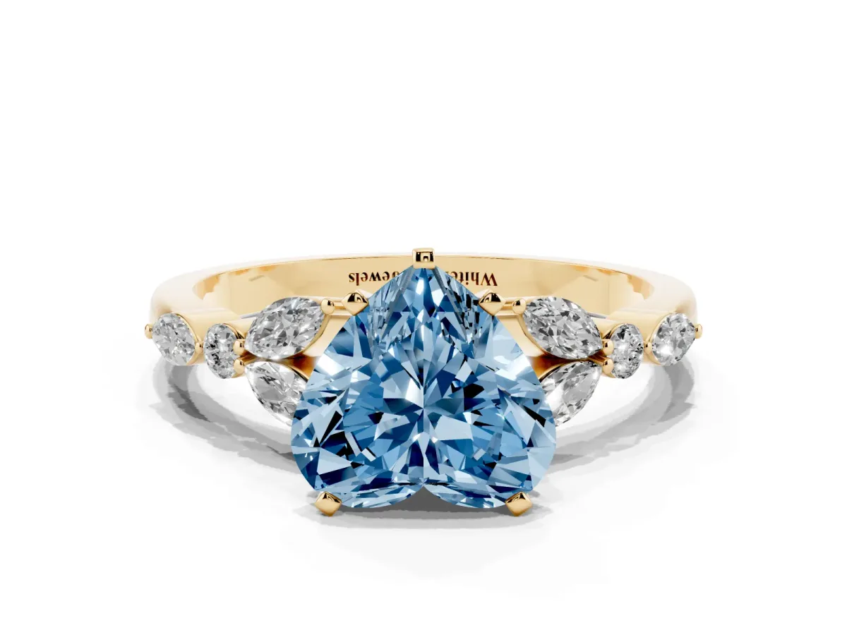 Fancy Blue Heart Cut Diamond Solitaire Ring with Side Stones and Four-Prong Setting Yellow gold