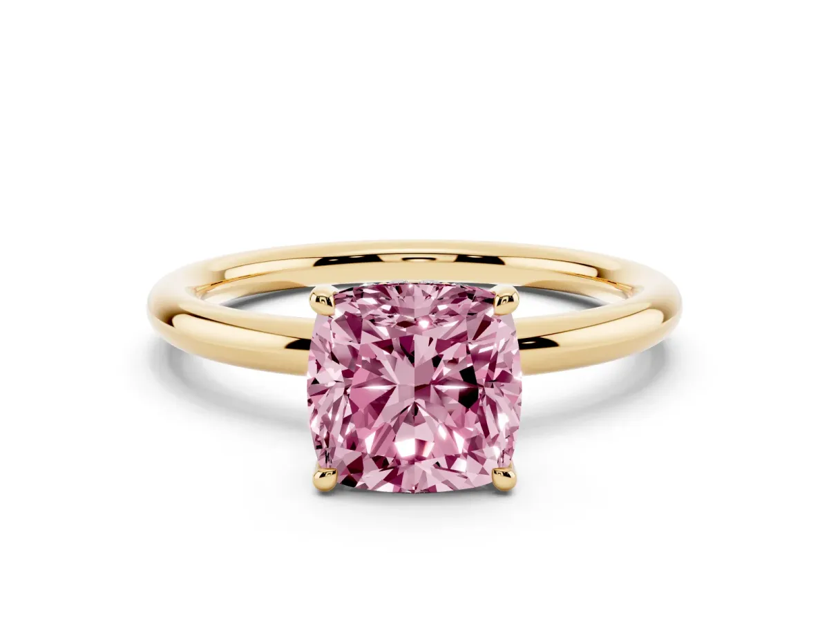 Fancy Pink Cushion Cut Diamond Solitaire Ring with Thin Band and Four-Prong Setting Yellow gold