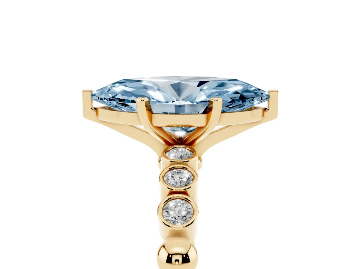 Fancy Blue Marquise Cut Solitaire Bezel Accent Diamond Engagement Ring with Beaded Band and Four-Prong Setting Yellow gold