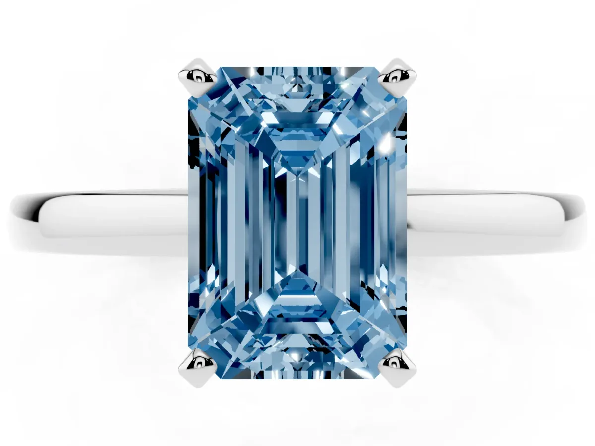 Fancy Blue Emerald Cut Solitaire Diamond Engagement Ring with Four-Prong Setting on a Classic Band Silver