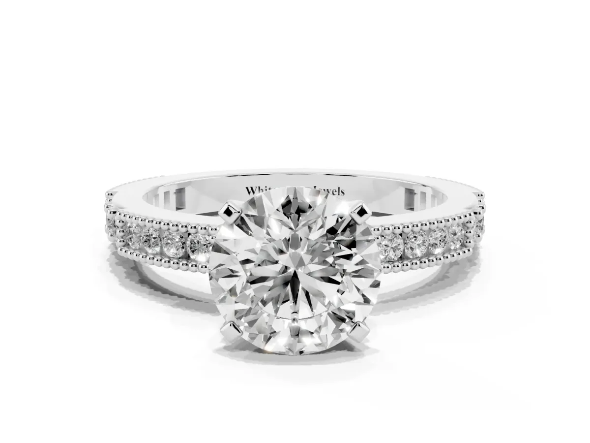Round Cut Solitaire with Pavé Band and Four-Prong Setting Silver