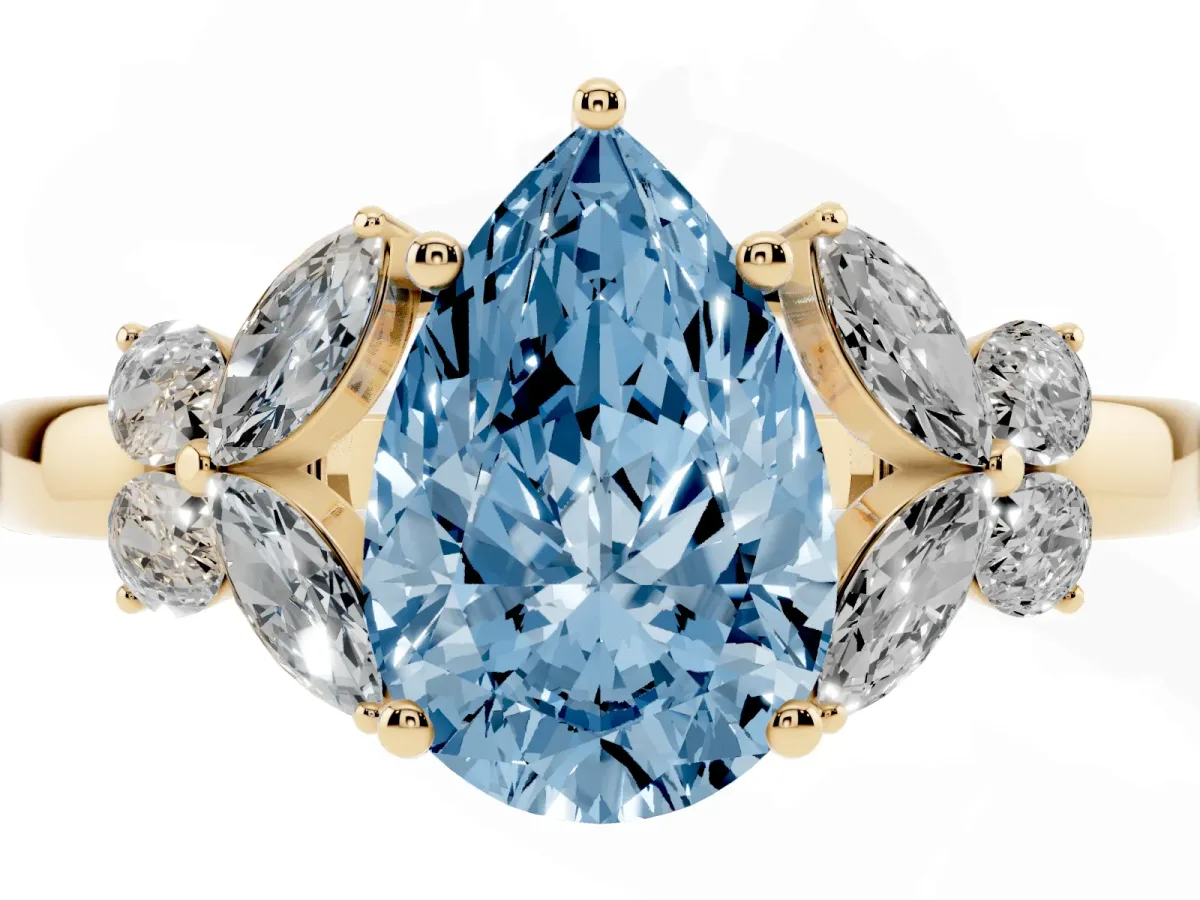 Fancy Blue Pear Cut Cut Solitaire Floral Diamond Ring with Four-Prong Setting Yellow gold