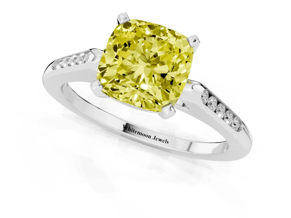 Fancy Yellow Cushion Cut Diamond Solitaire Ring with Channel Set Round Band and Prong Setting Silver