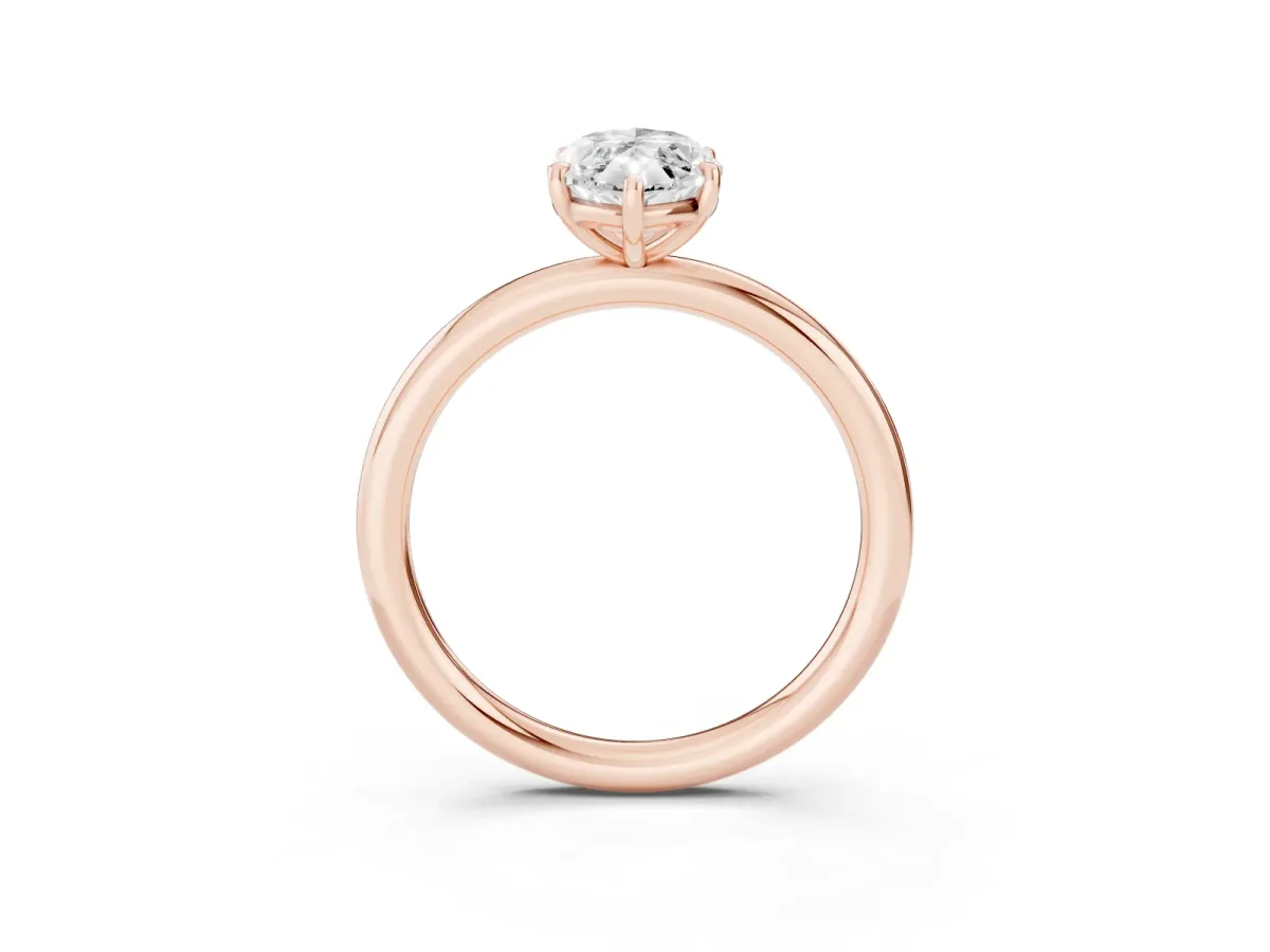 Marquise Cut Solitaire Diamond Ring with Four-Prong Setting on a Plain Band Rose gold