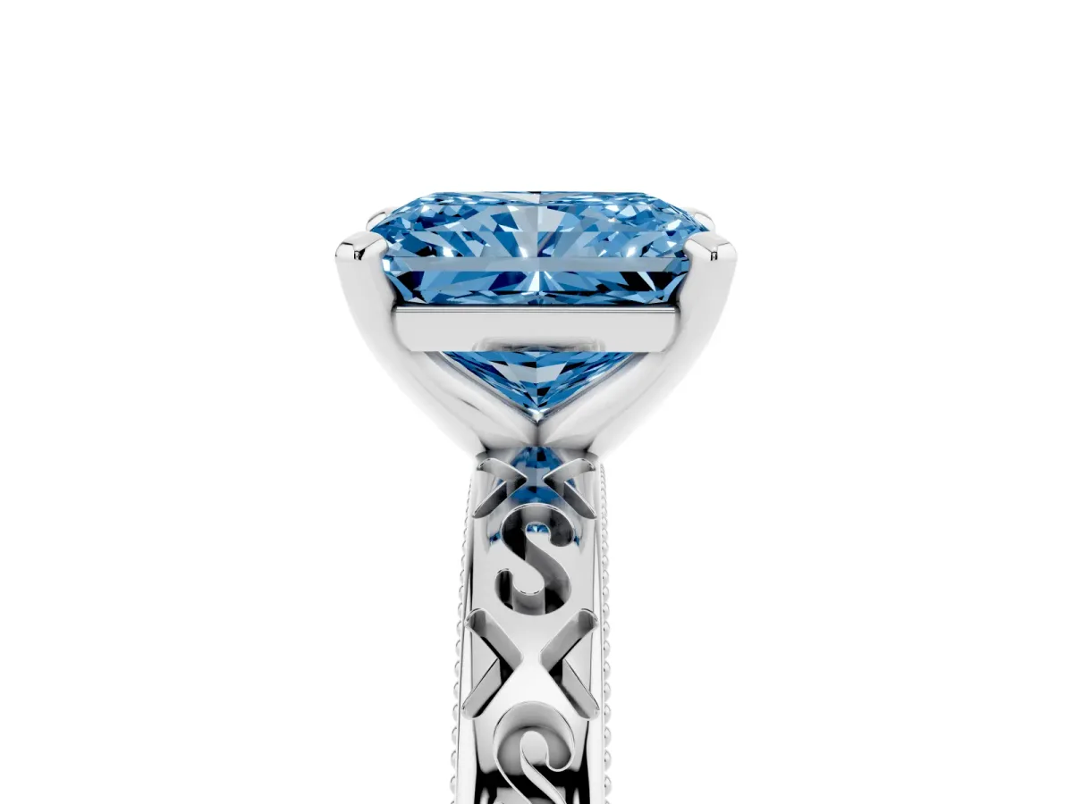 Fancy Blue Radiant Cut Solitaire Engagement Ring with Scrollwork Band and Four-Prong Setting Silver
