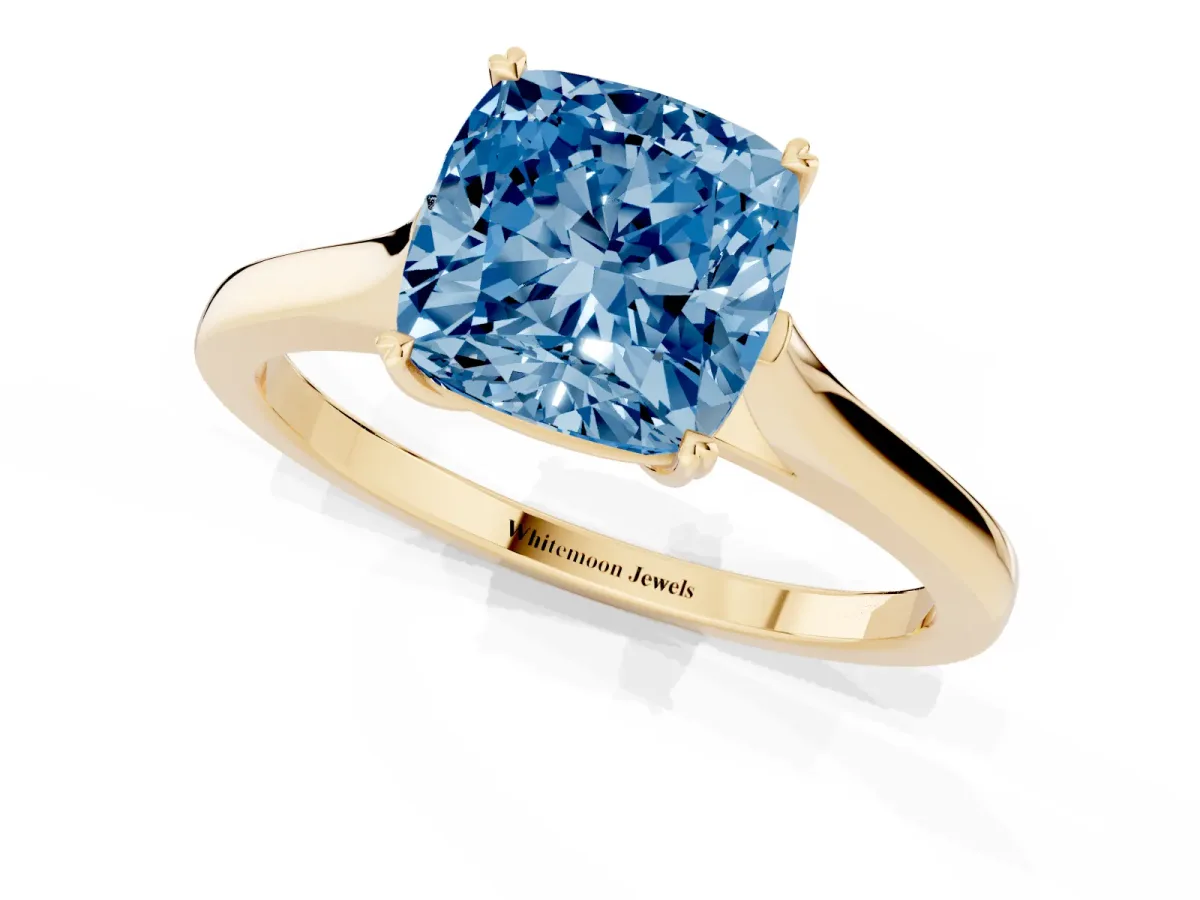Fancy Blue Cushion Cut Solitaire Heart Prong Engagement Ring with Tapered Band Yellow gold