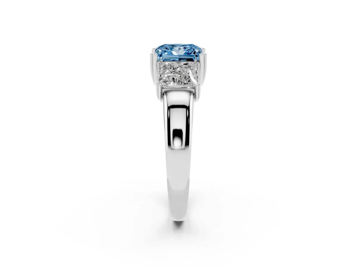 Fancy Blue Three-Stone Princess Cut Cut Diamond Ring with Channel Set Band and Four-Prong Setting Platinum