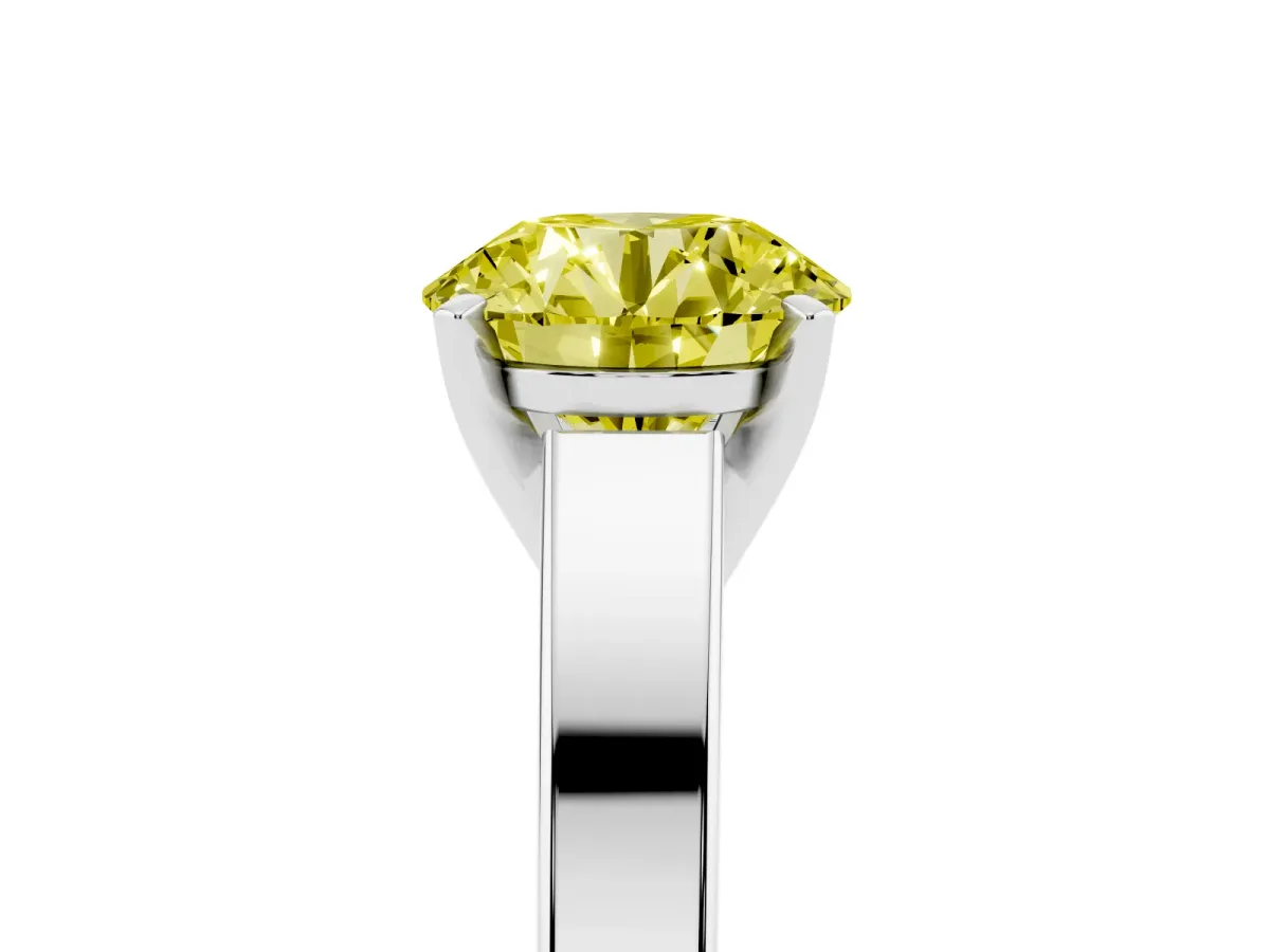 Fancy Yellow Round Cut Solitaire Engagement Ring with Four-Prong Setting and Tapered Band Silver