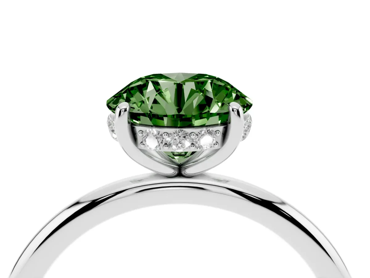 Fancy Green Round Cut Solitaire Diamond Ring with a Classic Band and Four-Prong Setting Silver