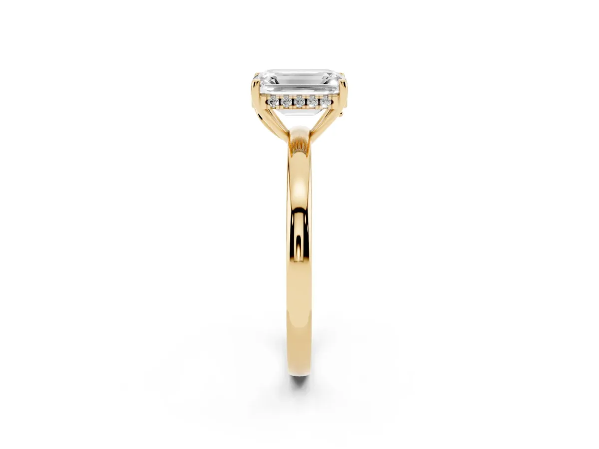Emerald Cut Solitaire Diamond Ring with Prong Setting and Plain Band Yellow gold