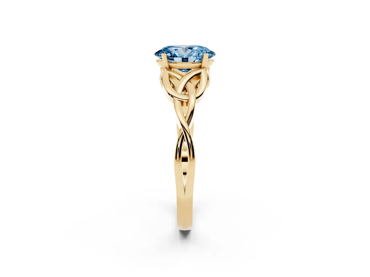 Fancy Blue Oval Cut Diamond Solitaire Engagement Ring with Celtic Knot Band and Four-Prong Setting Yellow gold