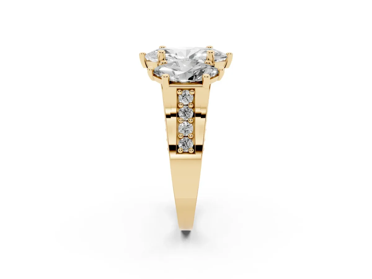 Marquise Cut Diamond Three-Stone Ring with Channel Set Band and Four-Prong Setting Yellow gold